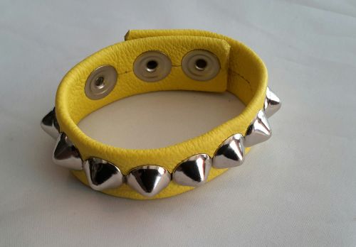 Yellow Leather Studded Cock Strap.